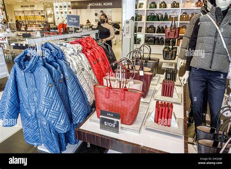 michael kors es outlet fashion accessory store commerce photos